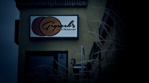 Outside Gryszek's at night.  Our logo was electronically inserted over the name of the real restaurant.